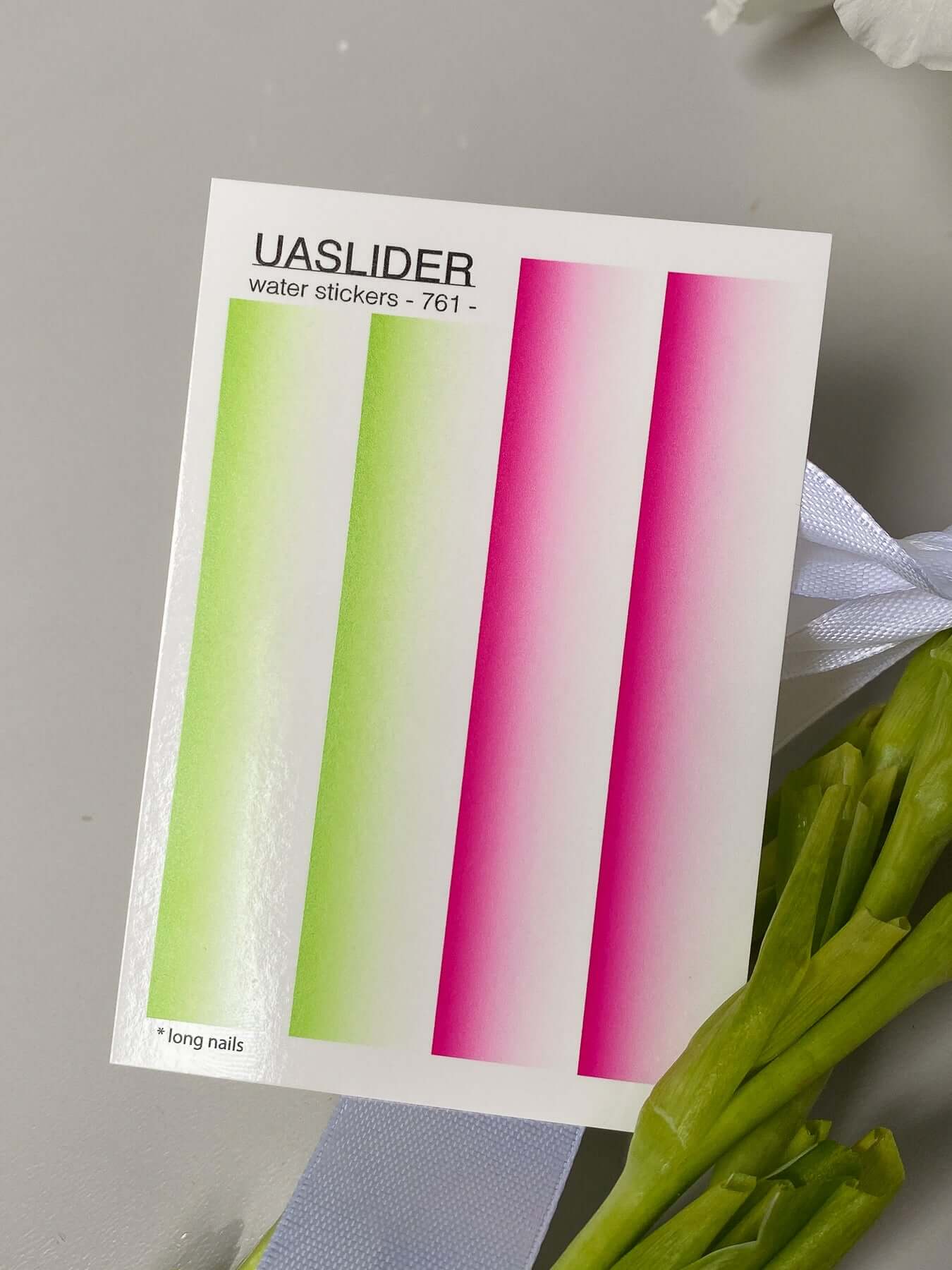 Nail Water Decal 761 featuring vibrant green and pink gradient designs on a white background.