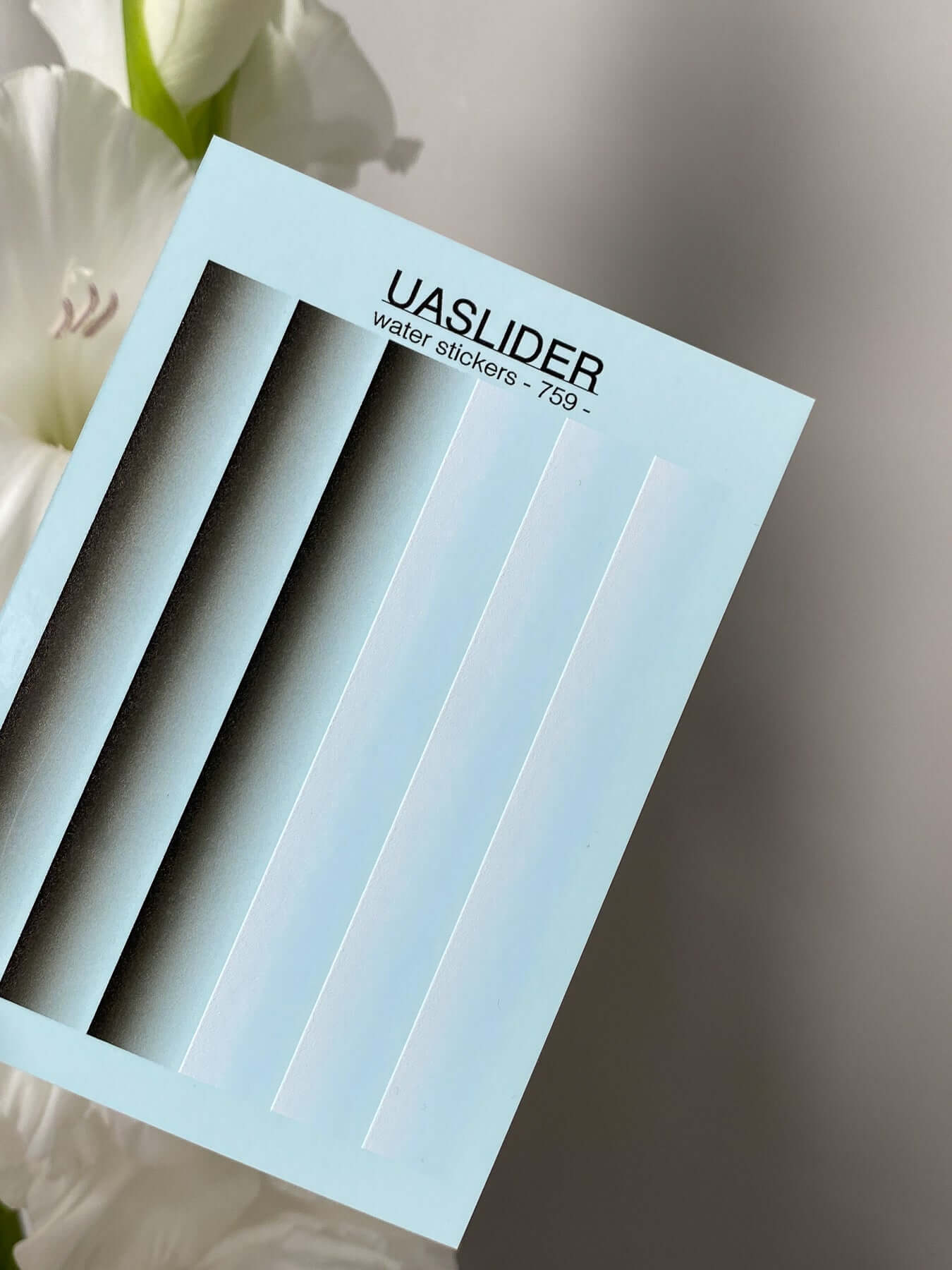 Nail Water Decal 759 packaging featuring water slide nail decals in various designs.