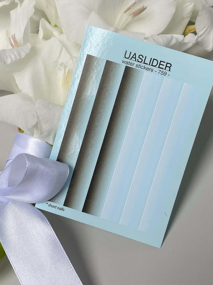 Nail Water Decal 759 showcased with short nail water stickers on a blue card against a floral background.