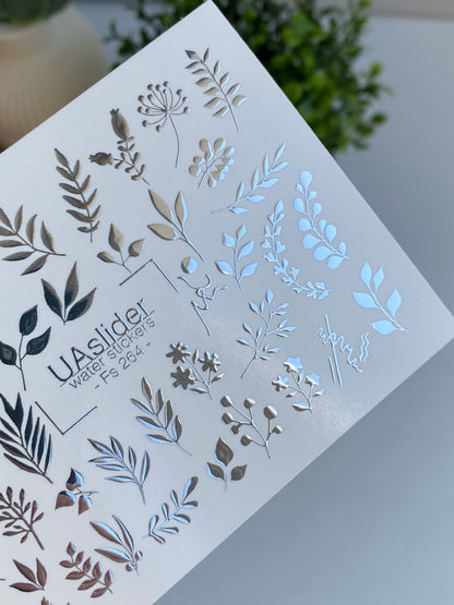 Köröm víz matrica Fs-264 | Botanikus vízcsúsztatós köröm matricák | Ezüst fólia levelek és virágos ágvégek