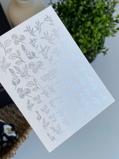 Köröm víz matrica Fs-266 | Botanikus vízcsúsztatós köröm matricák | Ezüst fólia levelek és ágak