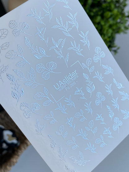 Köröm víz matrica Fs-266 | Botanikus vízcsúsztatós köröm matricák | Ezüst fólia levelek és ágak