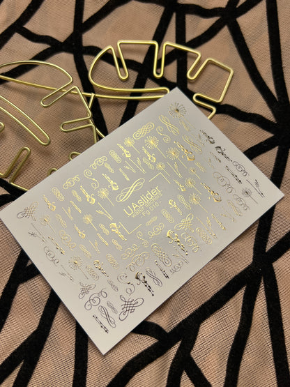 Naklejki na paznokcie wodne Fg-016 | Eleganckie wodne naklejki na paznokcie z złotą folią | Zawijasy i ozdoby kaligraficzne