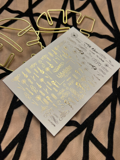 Naklejki na paznokcie wodne Fg-016 | Eleganckie wodne naklejki na paznokcie z złotą folią | Zawijasy i ozdoby kaligraficzne