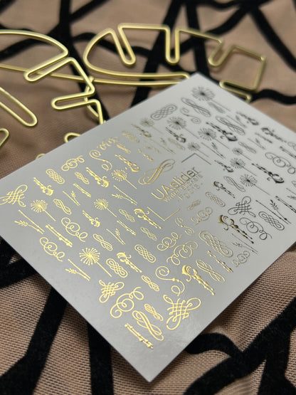 Naklejki na paznokcie wodne Fg-016 | Eleganckie wodne naklejki na paznokcie z złotą folią | Zawijasy i ozdoby kaligraficzne