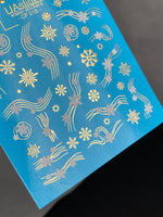Nail Water Decal CF-015 | Winter Water Slide Nail Decals, Silver Snowflakes and Gold Foil Shooting Stars - UASLIDER