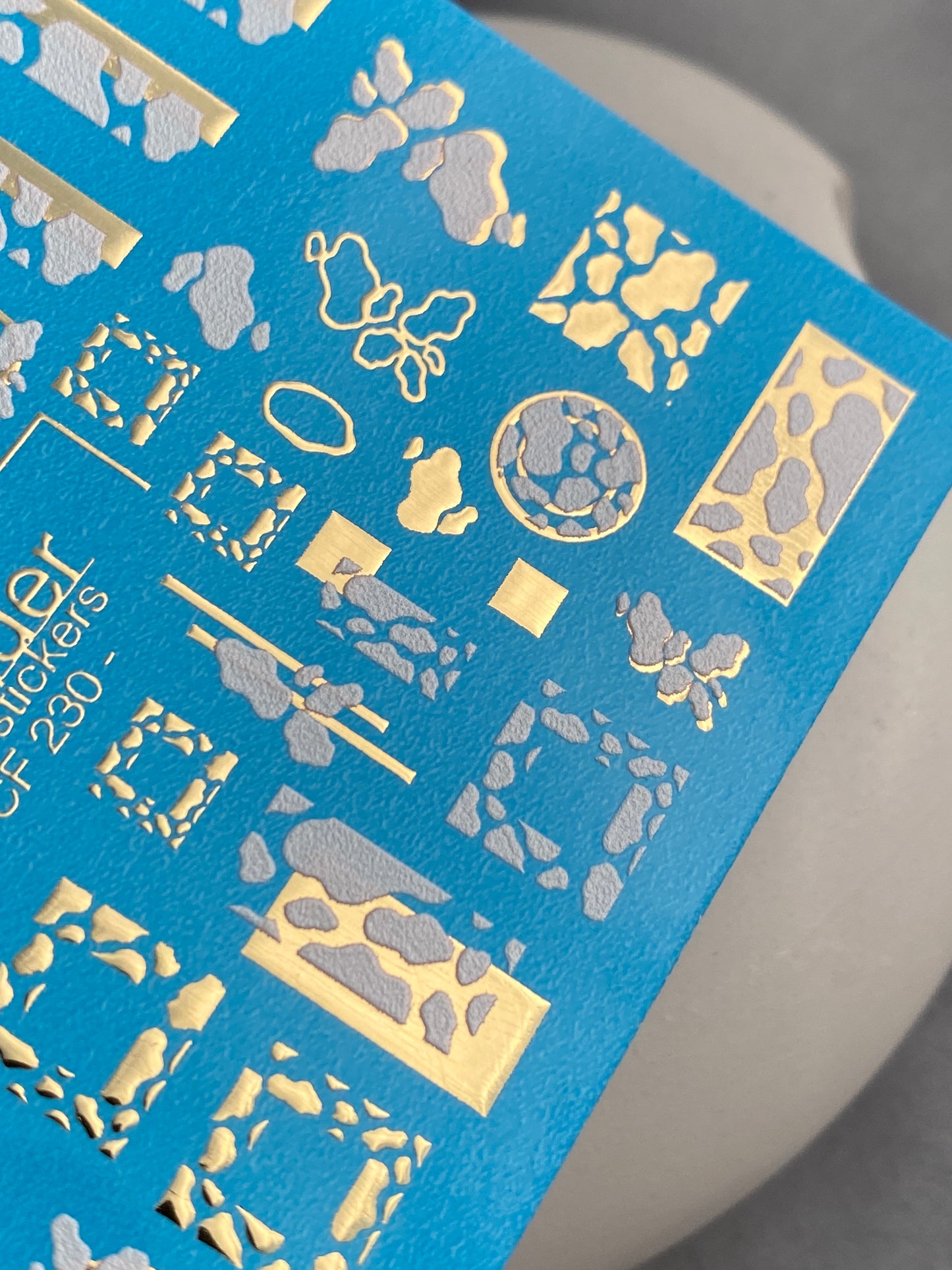 Nail Water Decal CF-230 | Cow Print Water Slide Nail Decals | White & Gold Geometric Design