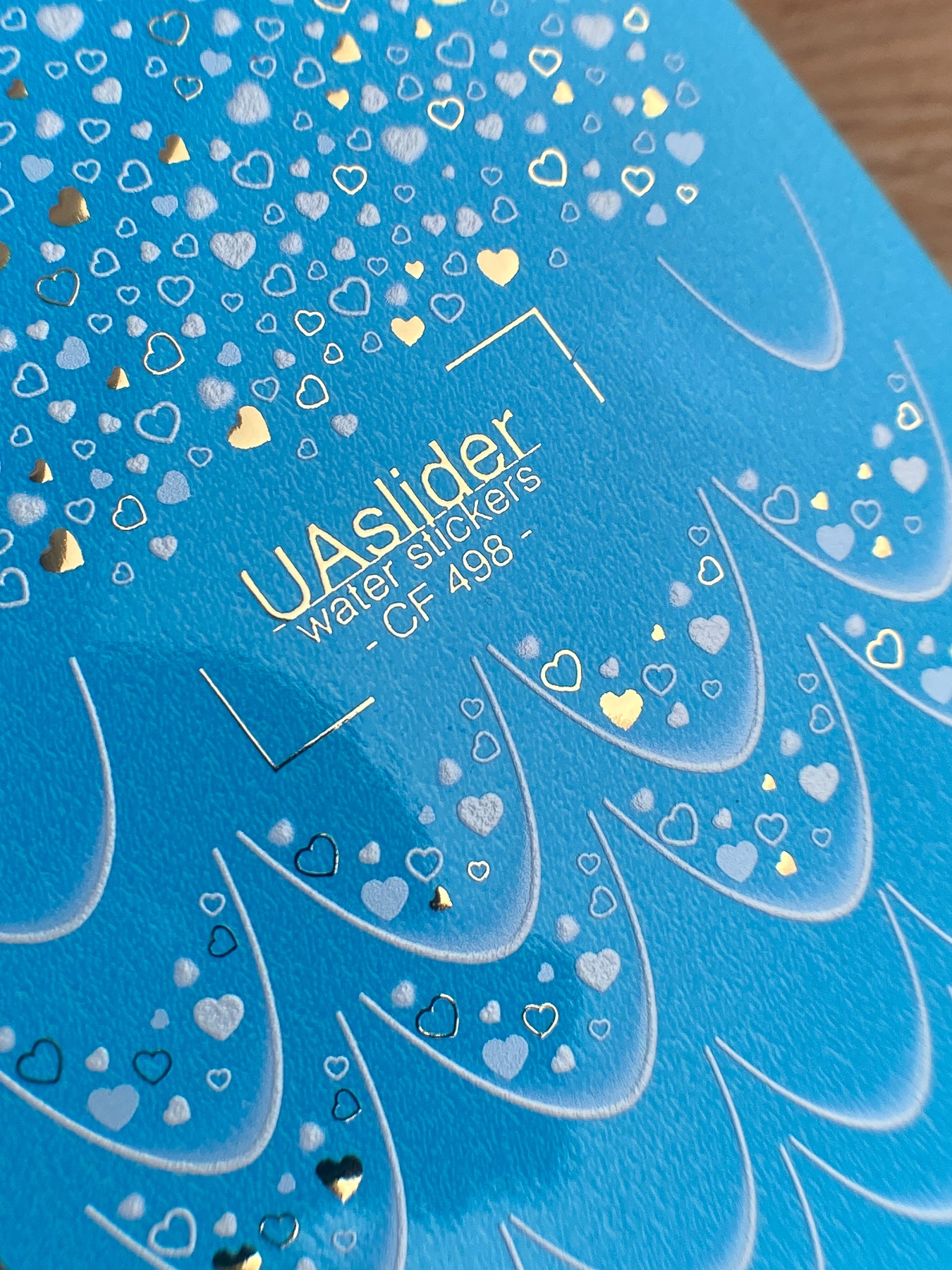 Köröm víz matrica CF-498 | Kék és fehér szív köröm víz matricák arany fóliával | Romantikus köröm matricák