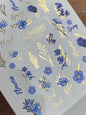 Calcomanía de Agua para Uñas CF-209 | Calcomanías de Agua para Uñas | Flores Silvestres Azules con Detalles en Papel Dorado