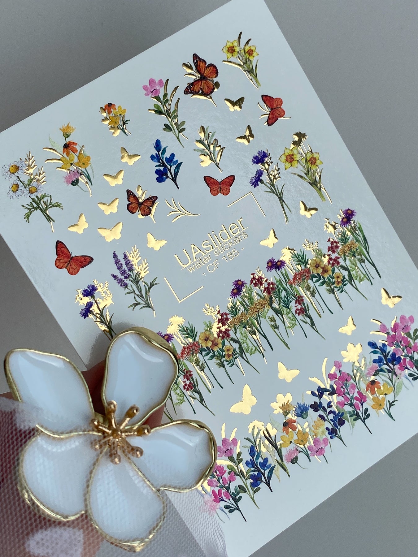 ملصق مائي للأظافر CF-185 | ملصقات مائية للأظافر | حقول الأزهار البرية والفراشات الذهبية