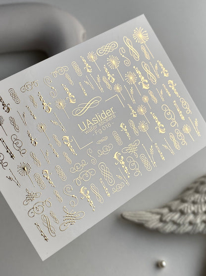 Naklejki na paznokcie wodne Fg-016 | Eleganckie wodne naklejki na paznokcie z złotą folią | Zawijasy i ozdoby kaligraficzne
