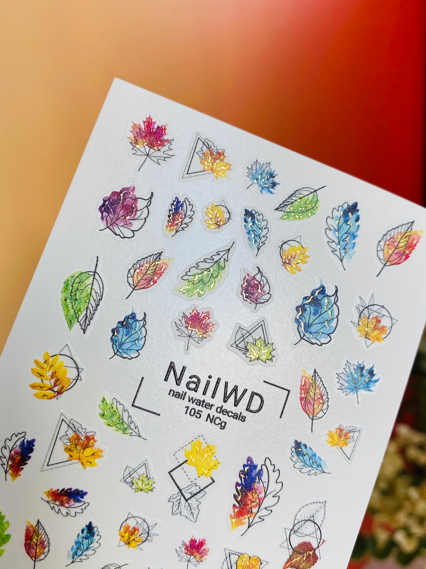 Naklejka na paznokcie wodna 105 NailWD | Wodne naklejki na paznokcie kolorowe jesienne liście | Geometryczne wzory jesiennego zdobienia paznokci